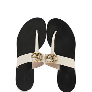 Gucci Women's Black and White Sandals with Gold Accent